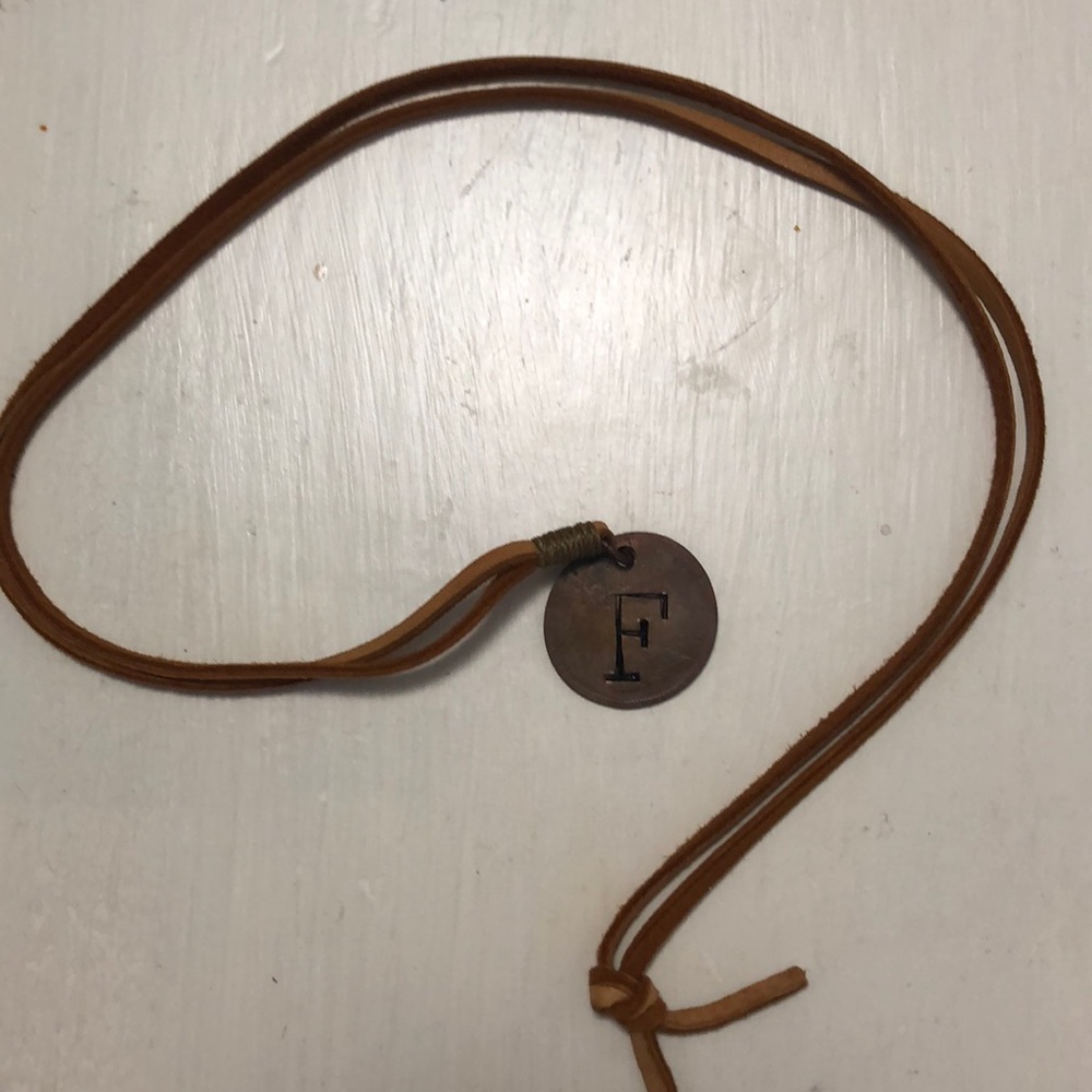Long leather necklace with coin